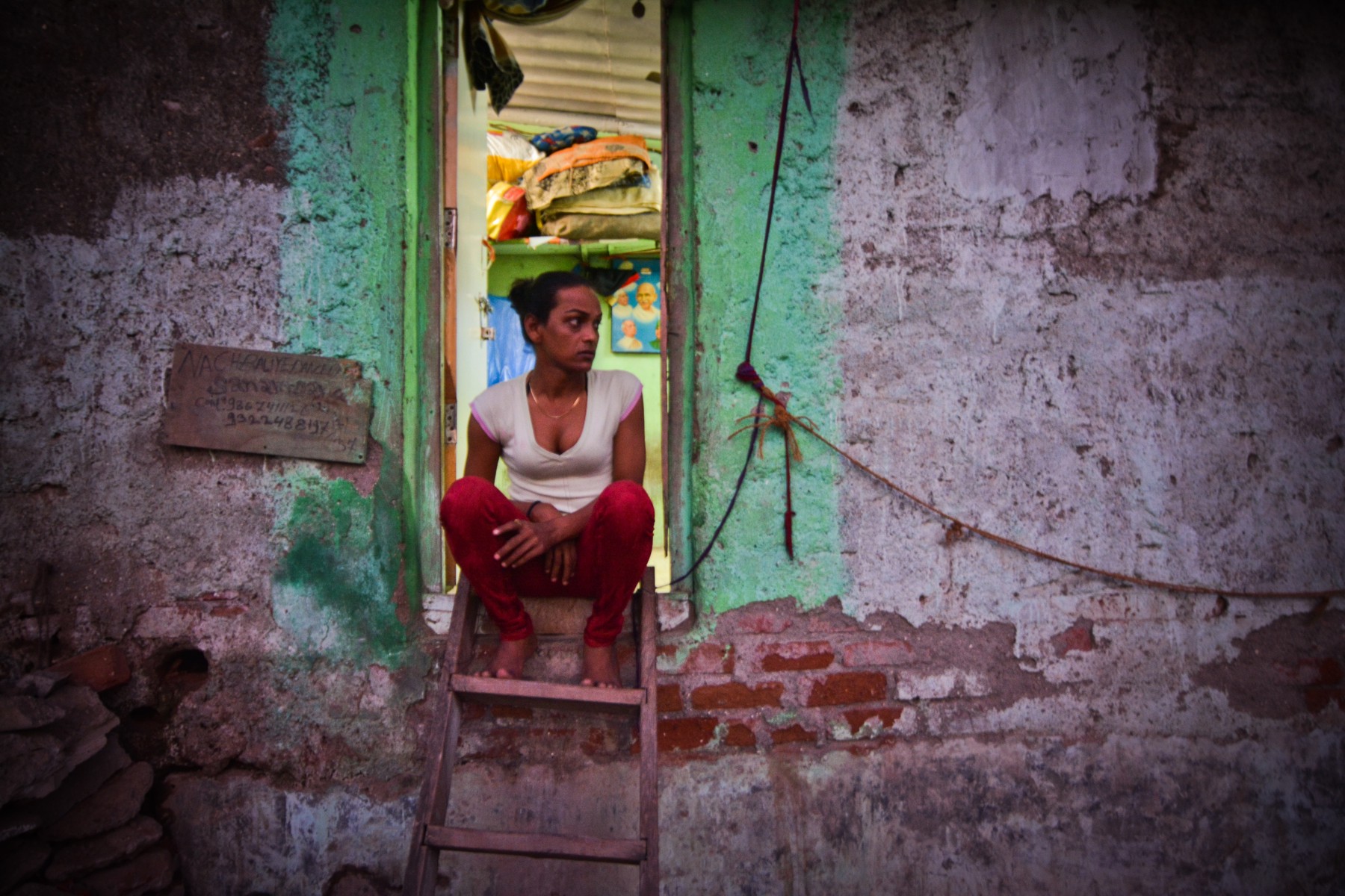 Sanam,sitting outside her house in Mumbai.The transgender community has been struggling for a life of dignity, away from discrimination and exclusion. This year, in April 2015 the upper house of the Indian Parliament, the Rajya Sabha passed the Rights of Transgender Persons Bill, 2014, a private members bill moved by DMK member of parliament (MP),Tiruchi Siva. The Bill was passed unanimously after it received unanimous support. “There are 4.5 lakh transgenders in the country and they are discriminated against. The Bill will create conditions for an equal society” Siva, the MP who moved the Bill said. It is for the first time in 45 years that a private members bill ahs been passed by the Rajya Sabha. The central government, while endorsing the spirit behind the Bill and making a commitment to bring in such a law had said at the time that since such a proposed legislation involved nine different ministeries, the “synergy” would need to be worked out. The Bill moved in April 2015, provides for creation of welfa Vignesh Krishnamoorthy