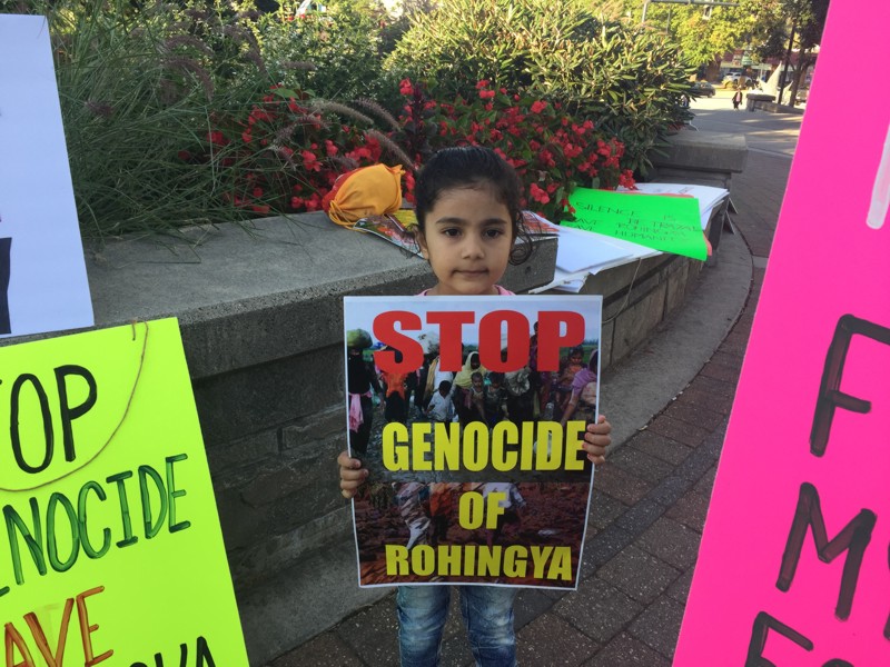 About 50 demonstrators showed up at a rally for Rohingya refugees at Surrey's Holland Park on Saturday evening